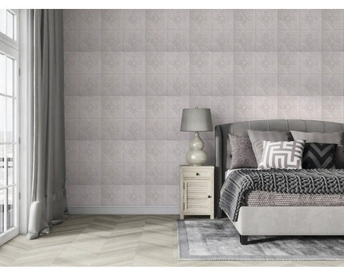 Dormitor cu panouri de perete texturate, pat și veioză.