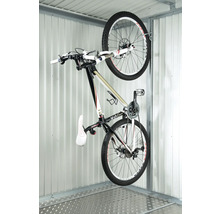 Bicicletă pe un suport de biciclete într-un garaj