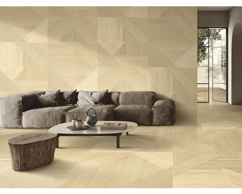 Cameră de zi cu canapea, masă și gresie și faianță cu model geometric