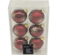 Șase globuri roșii de Crăciun din sticlă cu model de stea într-un ambalaj transparent.