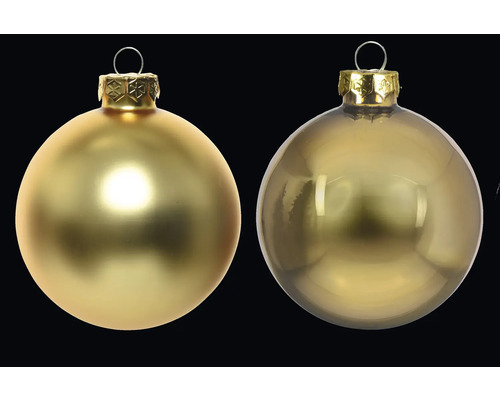 Două globuri aurii de Crăciun pentru decorarea bradului de Crăciun