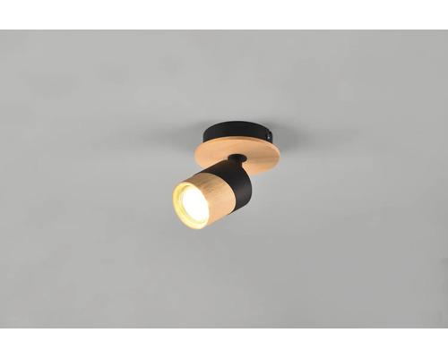 Spot luminos din lemn și metal