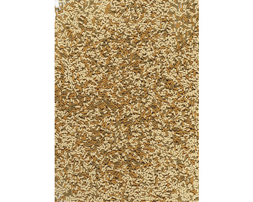 Granule de hrană pentru pești în diferite culori ca fundal