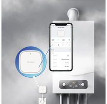 Detector de gaz Tellur cu vizualizarea aplicației pentru smartphone afișată lângă cazanul de încălzire