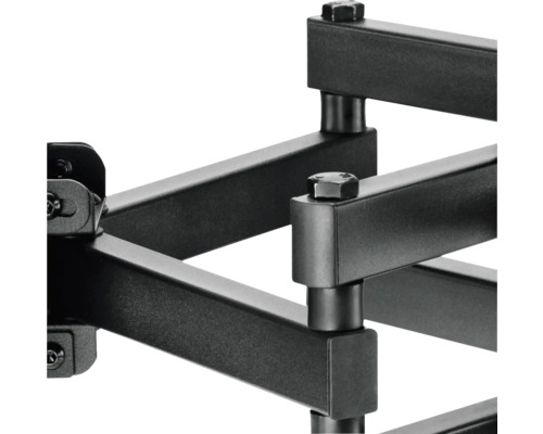 Prim-plan cu un suport TV de perete negru cu șuruburi