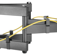 Imagine detaliată cu un suport de perete pentru televizor gri cu rutare cabluri