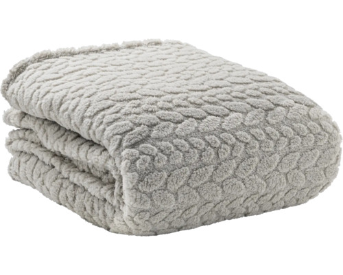 Pătură moale împăturită cu model în relief