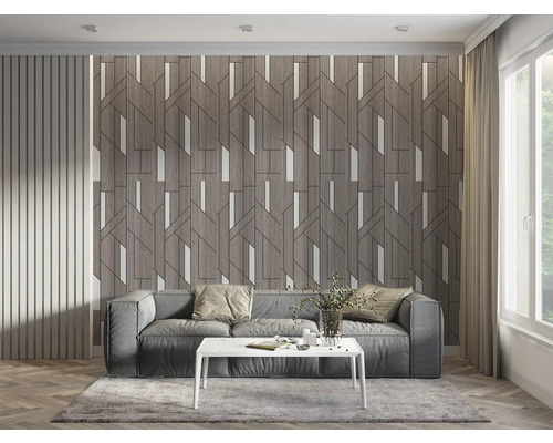 Cameră de zi cu canapea gri, masă albă și tapet cu model