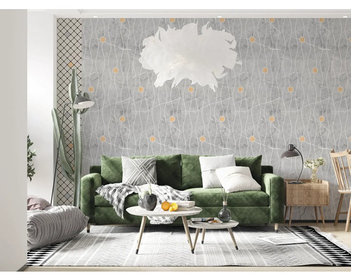 Living cu canapea verde, măsuțe de cafea și design decorativ pe perete