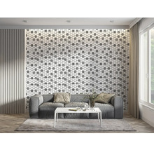 Living modern cu canapea gri, masă albă și perete cu plăci hexagonale