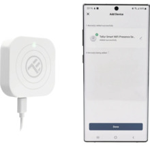 Senzor de prezență inteligent WiFi Tellur lângă un smartphone cu mesajul dispozitiv adăugat cu succes