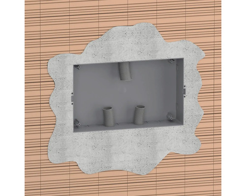 Cutie de montaj încastrat cu tuburi goale introduse într-un perete