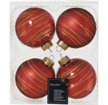 Patru globuri roșii de Crăciun din sticlă cu dungi aurii într-un ambalaj.