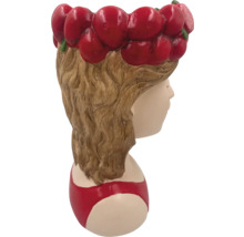 Ghiveci de flori în formă de cap de fată cu ghirlandă de flori de cireș