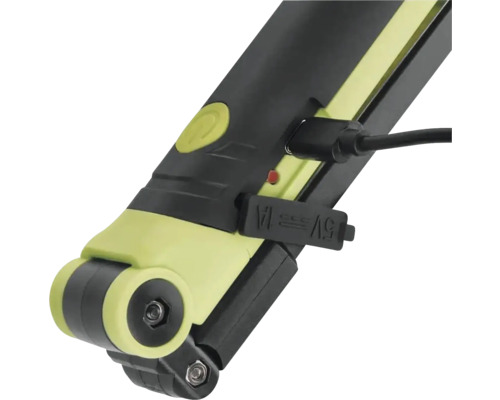 Prim-plan al unei lămpi de lucru cu cablu de încărcare