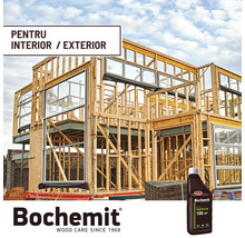 Casă din lemn în construcție cu produs de protecție a lemnului pentru interior și exterior