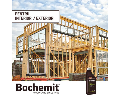 Casă din lemn în construcție cu produs de protecție a lemnului pentru interior și exterior