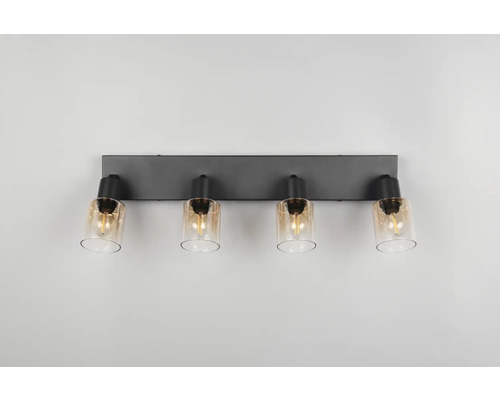 Lumină de perete cu patru abajururi de sticlă pe un suport dreptunghiular