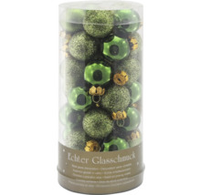 Decorațiuni autentice din sticlă în nuanțe de verde într-un ambalaj transparent.