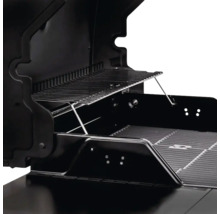 Imagine din interior a unui grătar pe gaz negru cu grătar