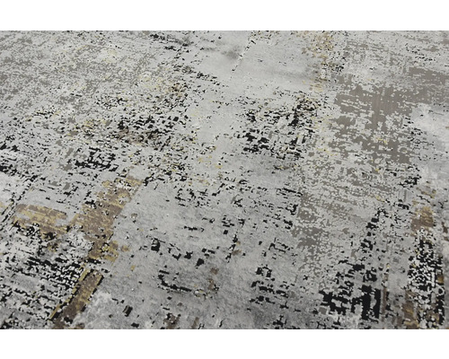 Prim-plan al unui covor cu un model abstract