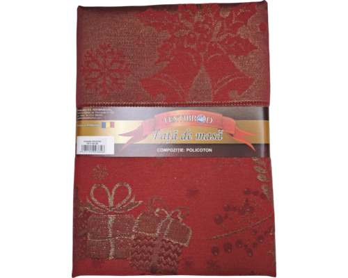 Față de masă roșie ambalată cu motive de Crăciun.