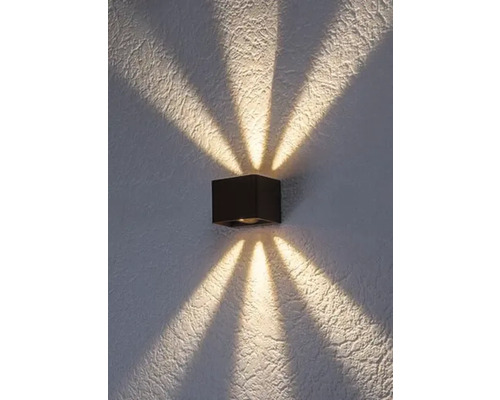 Lumină de perete pătrată cu raze de lumină pe perete