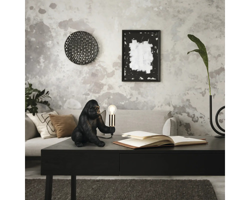 Living decorativ cu lampă de masă gorilă