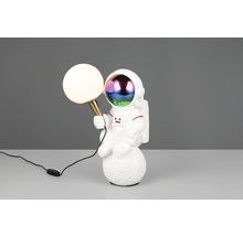 Lampă decorativă astronaut pe o bază lunară, cu o sferă luminoasă.