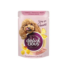 Delick Cious desert pentru câini cu curcan și fructe tropicale în sos cremos