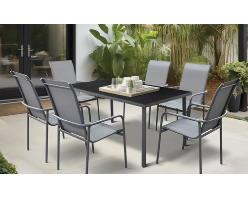 Set de mobilier de grădină cu masă și șase scaune pe o terasă