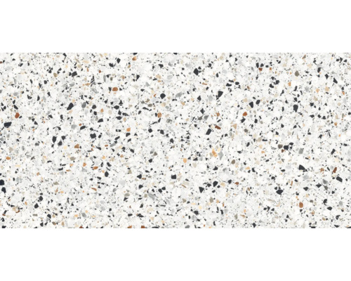 Prim-plan cu o placă de terrazzo cu așchii mici de piatră colorate.