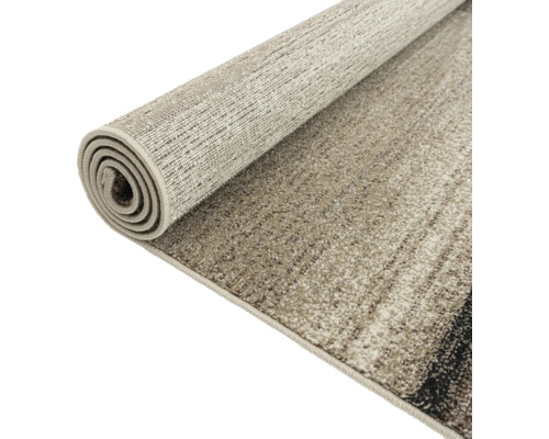 Covor rulat cu model geometric