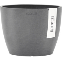Ghiveci rotund Ecopots din plastic reciclat cu o suprafață cu aspect de piatră.