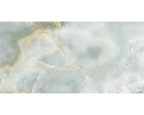 Prim-plan cu o placă de marmură deschisă la culoare, cu nervuri subtile