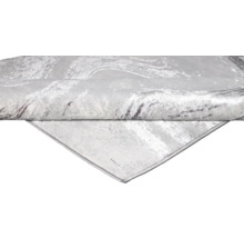 Imagine detaliată a unui covor gri cu model ondulat