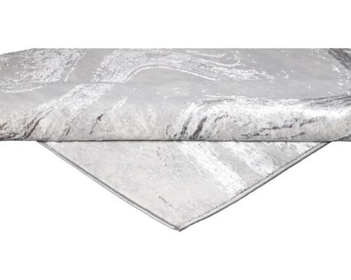 Imagine detaliată a unui covor gri cu model ondulat