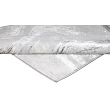 Prim-plan al unui covor gri cu model abstract