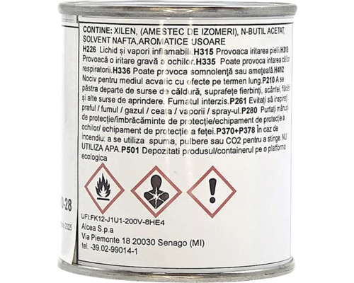 Etichetă a unei cutii metalice cu simboluri de pericol pentru inflamabil, pericol pentru sănătate și iritant, plus fraze de pericol.