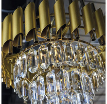 Candelabru cu elemente metalice aurii și pandantive din cristal transparent