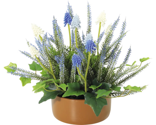 Plantă artificială decorativă cu flori albastre și albe într-un ghiveci