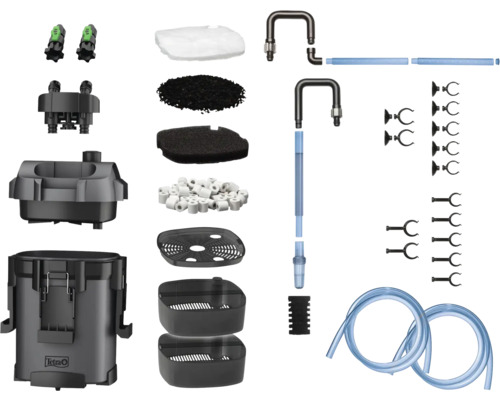Set filtru extern pentru acvariu Tetra format din carcasă, materiale filtrante, țevi, furtunuri și materiale de fixare.