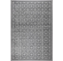 Covor cu un model geometric format din pătrate concentrice.