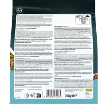 Spatele ambalajului hranei pentru pești Tetra Pond Multi Mix cu instrucțiuni, ingrediente, greutatea de 760 grame și 4 litri, sigla Tetra și simbolul de protecție UV.