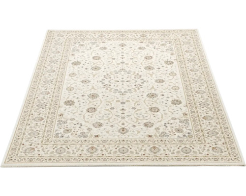 Covor dreptunghiular cu model floral oriental clasic și bordură decorativă.