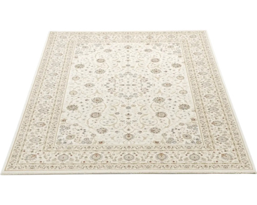 Covor oriental dreptunghiular cu model floral, bordură și medalion central.
