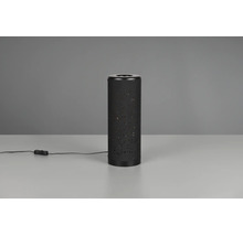 Lampă de masă cilindrică din metal negru, cu model perforat și cablu negru cu întrerupător.