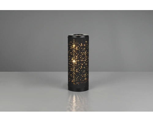 Veioză LED cilindrică neagră din metal cu efect decorativ de stele prin model perforat.