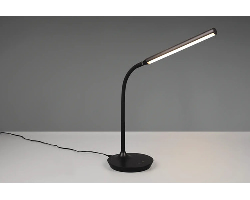 Lampă de birou LED neagră cu braț flexibil și bază rotundă.