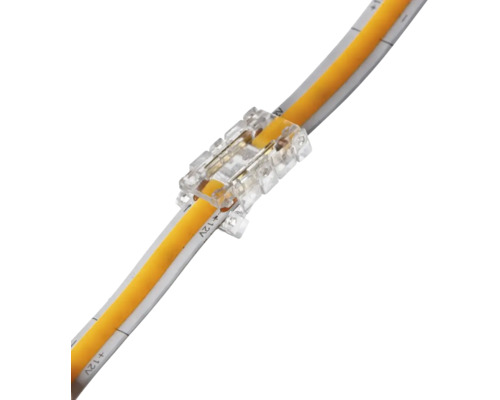 Conector rapid din plastic transparent pentru benzi LED COB de 12 Volți pentru conectarea directă a două capete de bandă.